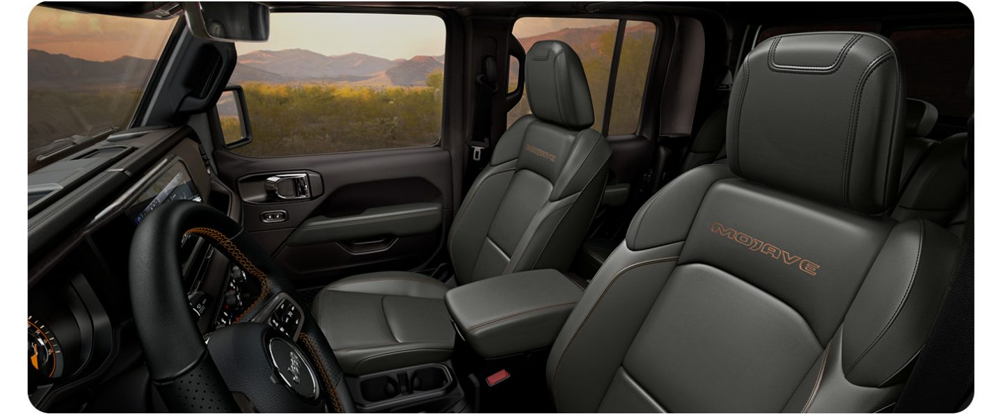 The front seats in the 2026 Jeep Gladiator Mojave X.
