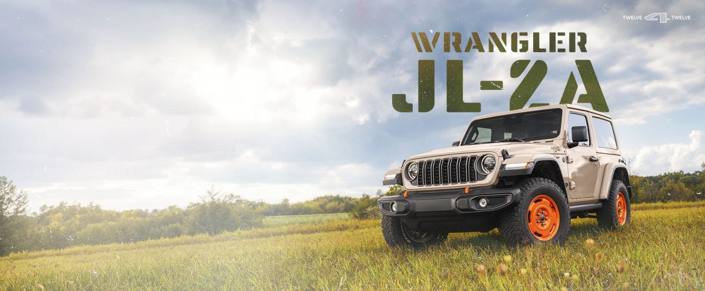 A 2027 Jeep Wrangler JL-2A sits parked on a grassy field spotted with dandelions. The words WRANGLER and JL-2A are superimposed behind it.